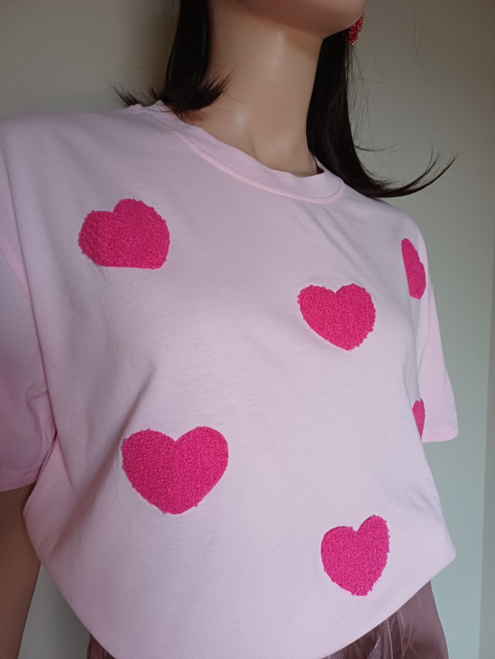 Roze katoenen shirt met harten aan de voorzijde