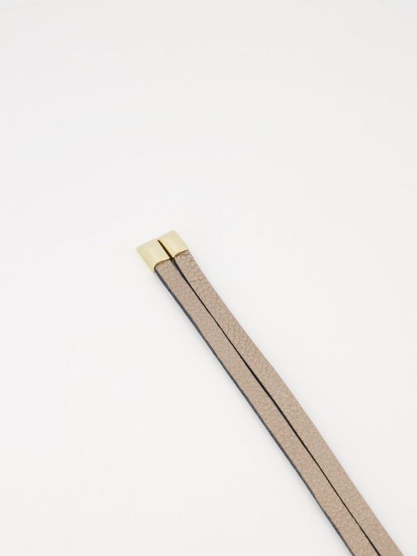 Leren wikkelriem in de kleur brons.