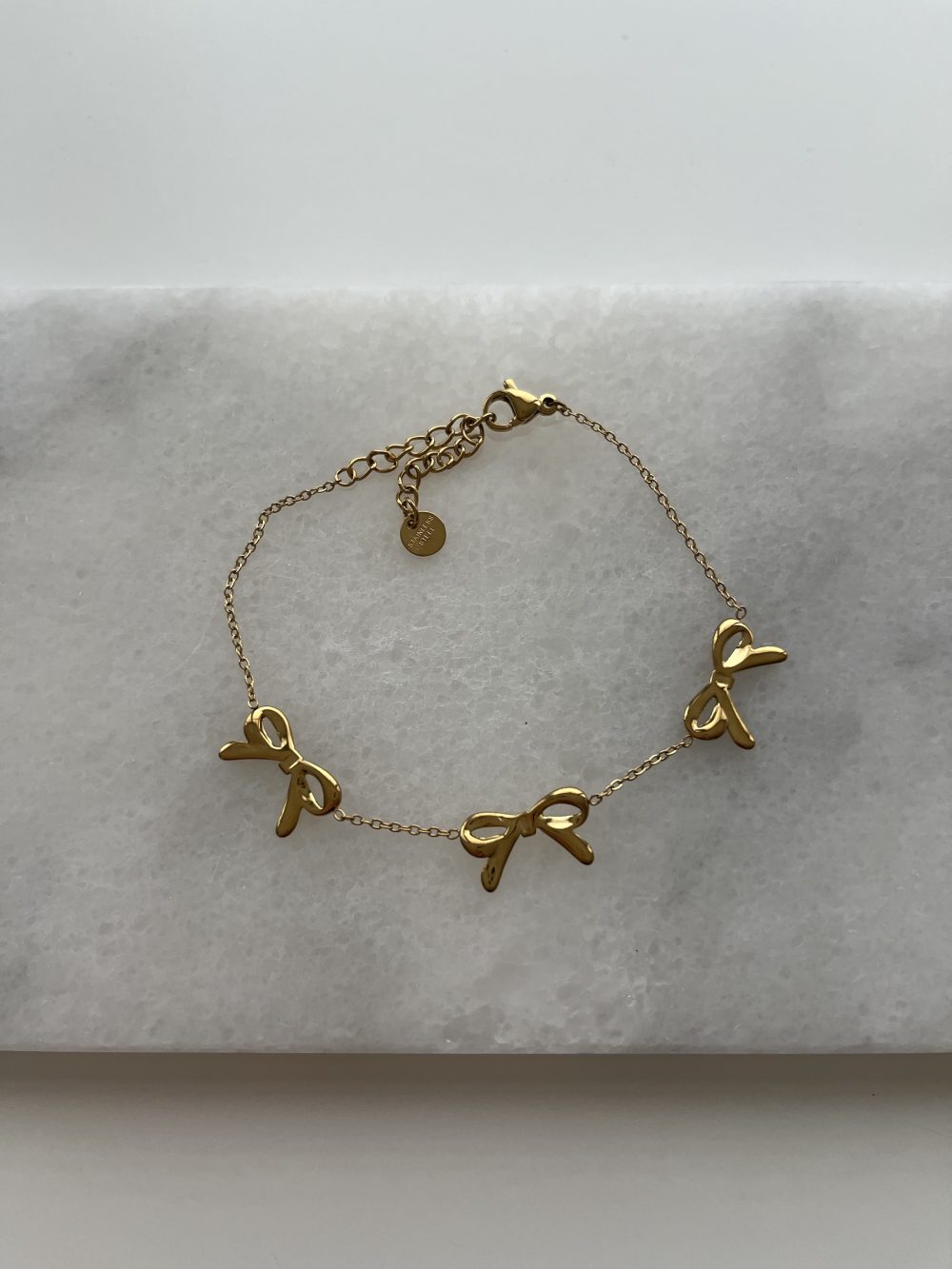 Armband met strikjes goud