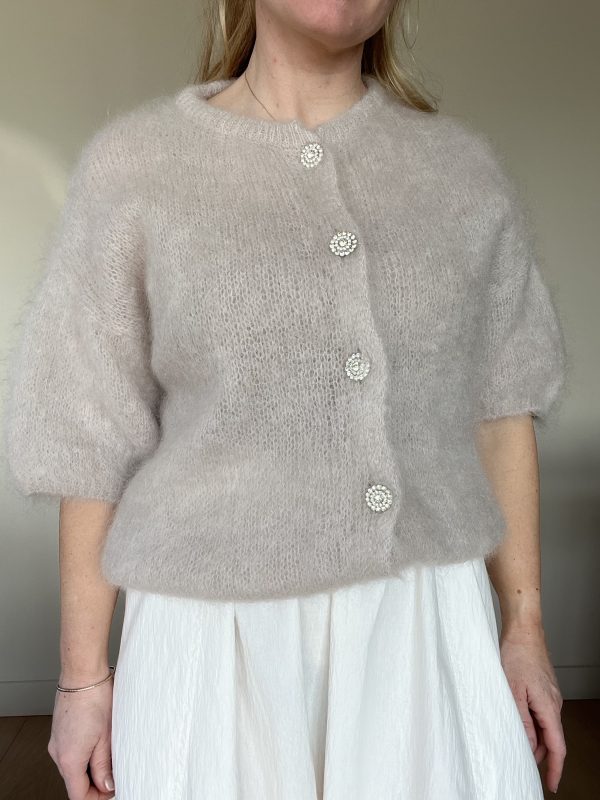 Mohair knit met korte mouw zand kleur.