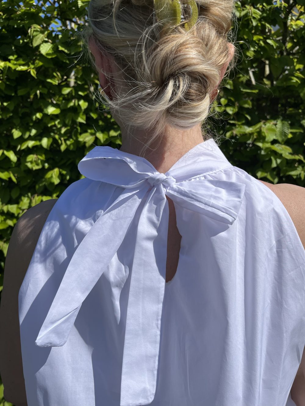 Blouse met strik mouwloos wit